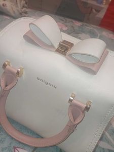 Check out this adorable pastel-colored handbag
