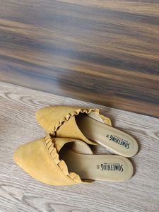 Black Heels And Yellow Flats