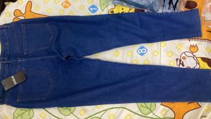 Shein Ankle length splatter detail knee slit jeans