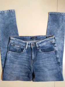 Highlander Brand Slim Tapered Jeans