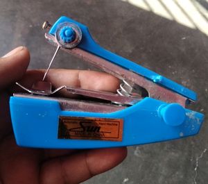 Vintage Handheld Sewing Machine
