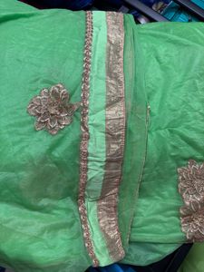 Green Fabric with Gold Embroidery
