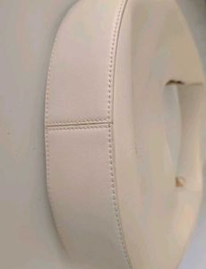 CHARLES &amp; KEITH Cream Philomena Half-Moon Bag