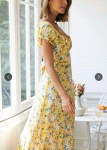 A-Line FloralPrinted Calf Length Yellow dress.
