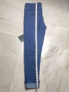 Distressed Blue Denim Jeans
