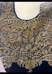 Arbia Ethnic Gown With Golden Work And Frills