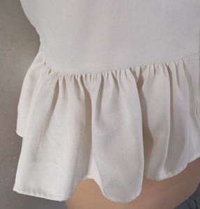 White Peplum Top