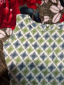 both Patterned Sleeveless Top and long kurti