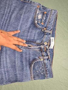 ZARA Ripped Knee Jeans
