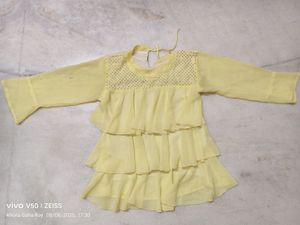 Elegant Yellow Tiered Dress with Embellished Neck