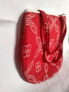 Read Colore Bandhani Print Handbag👜