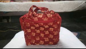 Haath Se Bana Lal Phoolon Wala Potli Bag - Eleganc