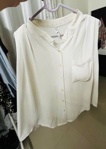 Sleeveless Button-Up Blouse