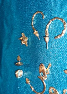 Assorted Gold Tone Earrings and Silver Rings