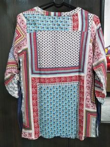 Latin Quarters Tie-up Sleeves Top