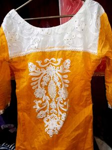yellow dress with nice white design