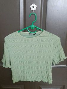 Green Textured Crop Top the size is medium