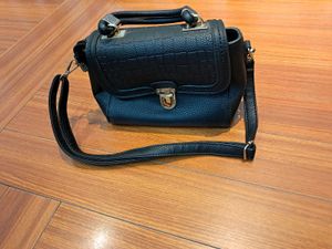 34) Black Croc-Embossed Satchel