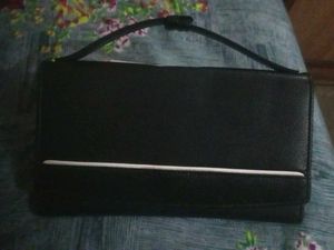 Khadims Clutch