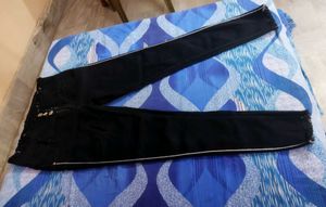 black skinny low waisted jeans with side stripes