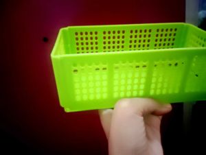 green basket bag with cover
