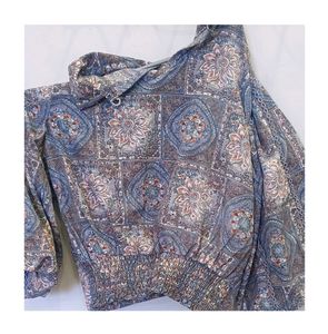 A multicolored top.