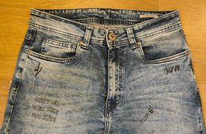 Distressed &amp; Graphic Print Jeans