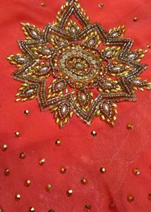 Elegant Orange Embellished Saree