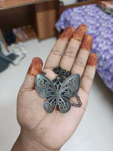classic butterfly oxidized locket.