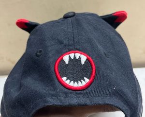 Elstinko Ebony Monster face Snapback Cap.