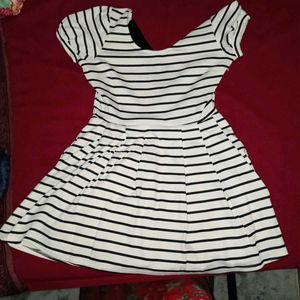 White Dress With a Bow in Back.