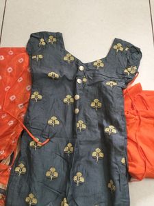 An Orange+Grey Suit