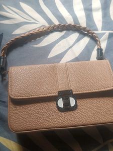 Elegant Wallet with Braided Strap