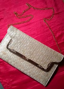 Elegant Beaded Clutch with Chain