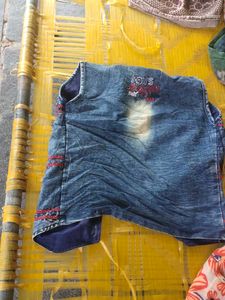 Denim Vest with Red Stitching