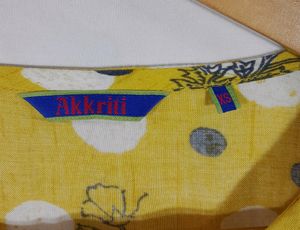 Akkriti Yellow Printed Front Opened Dress (Women)