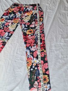 Straight Pant Floral Print On Black Base.
