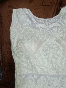 A Mint Green Floral Gown .