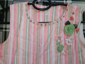 Beautiful top with flower , stone and pearl