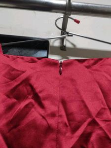 A Maroon Colour Gown