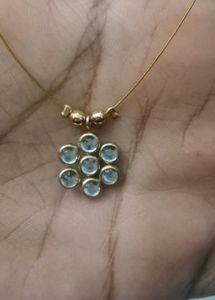 Elegant Gemstone Flower Pendant