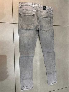 Distressed Gray Denim Jeans