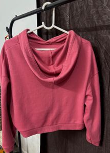 pink cropped length hoodie