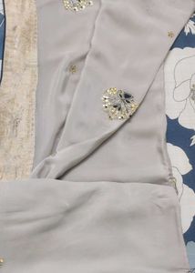 Grey saree with gold border