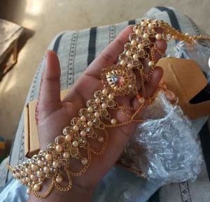 Gold tone headpiece