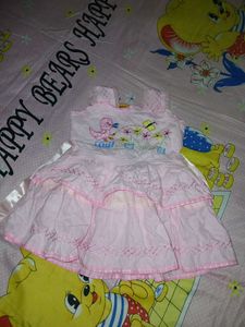 two baby girl dresses are there