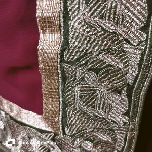 Heavy Zaria work, elegant maroon saree