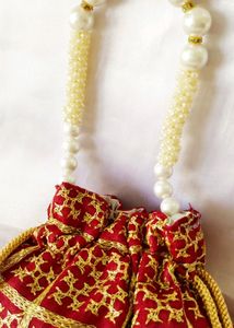 Maroon Beautiful Zari Embroidery Potli Bag