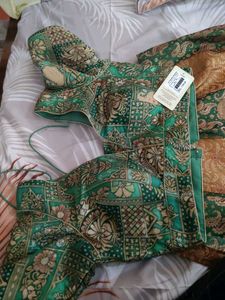 Embroidered Green and gold lehenga choli