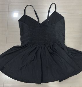 Black peplum top